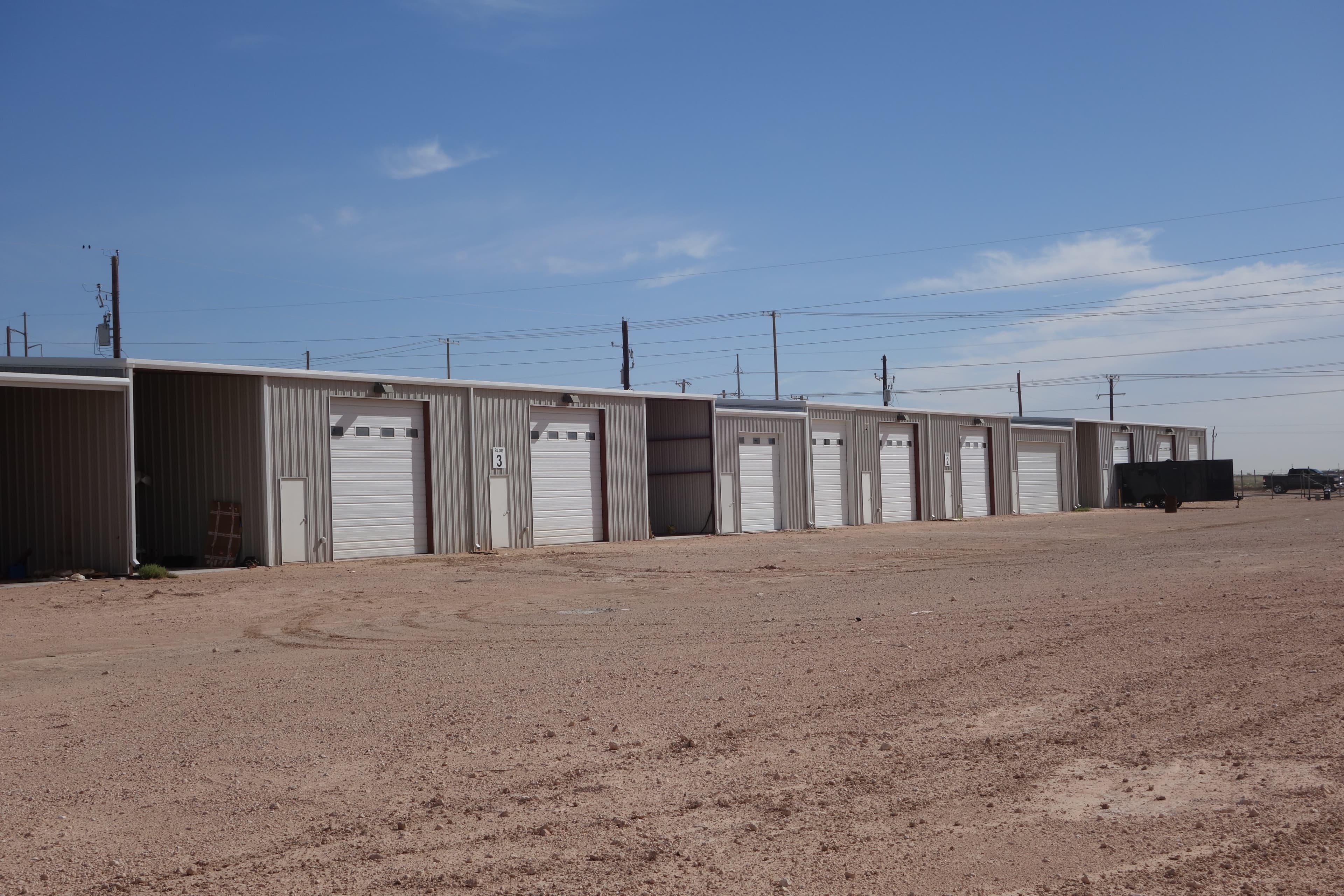 Row of buildings with overhead doors